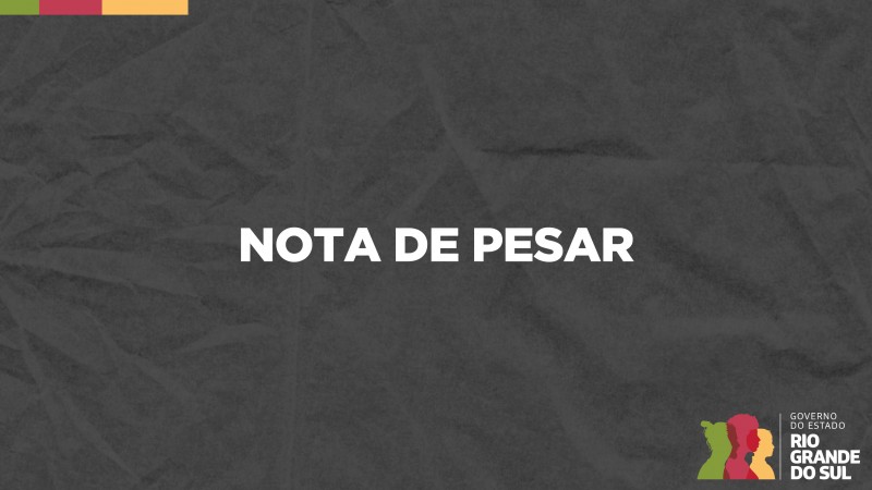 Card em fundo cinza escuro, no qual está escrito Nota de Pesar ao centro. No canto inferior direito do Card está a logomarca utilizada pela gestão 2023-2026 do governo do Rio Grande do Sul.