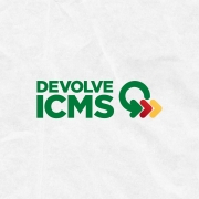 Card em fundo cinza com a logomarca colorida do programa Devolve ICMS ao centro. No canto inferior direito do Card está a logomarca utilizada pela gestão 2023-2026 do governo do Rio Grande do Sul.