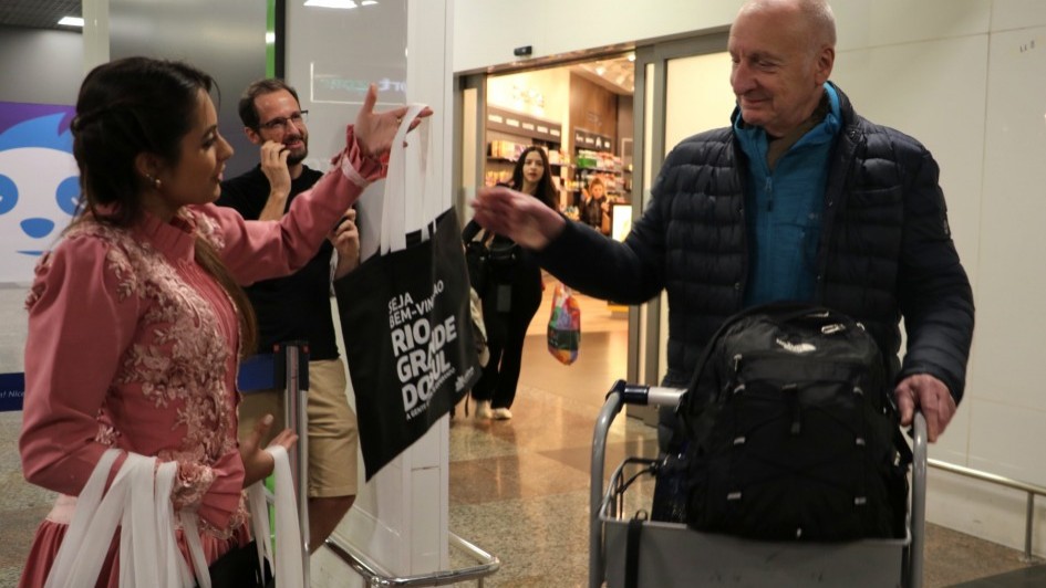 Recepção aos passageiros no aeroporto