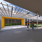 A foto é uma maquete que mostra o exterior de um prédio escolar. Em primeiro plano, há um pátio pavimentado com uma passarela coberta por uma estrutura metálica e colunas brancas. À esquerda, a entrada da escola é destacada por um painel amarelo. No centro da imagem, duas figuras humanas (uma mulher e uma menina) estão de pé. Ao fundo, pode-se ver a fachada de um ginásio e outros prédios da escola.