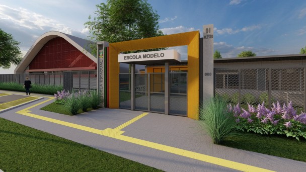 A imagem &eacute; uma reprodu&ccedil;&atilde;o de um projeto que mostra a entrada de uma escola com um p&oacute;rtico moderno em estrutura retangular amarela, onde est&aacute; escrita a identifica&ccedil;&atilde;o &ldquo;Escola Modelo&rdquo;. Um totem lateral exibe o bras&atilde;o estadual e a inscri&ccedil;&atilde;o &ldquo;Escola Estadual&rdquo;. O acesso &eacute; composto por cal&ccedil;adas cinzas com marca&ccedil;&otilde;es amarelas. H&aacute; canteiros com vegeta&ccedil;&atilde;o e flores nas laterais, e ao fundo aparecem pr&eacute;dios escolares com grades met&aacute;licas e um gin&aacute;sio de formato curvo.